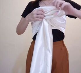 how to make an easy diy o ring top you can wear 6 different ways, Crossing and looping the fabric