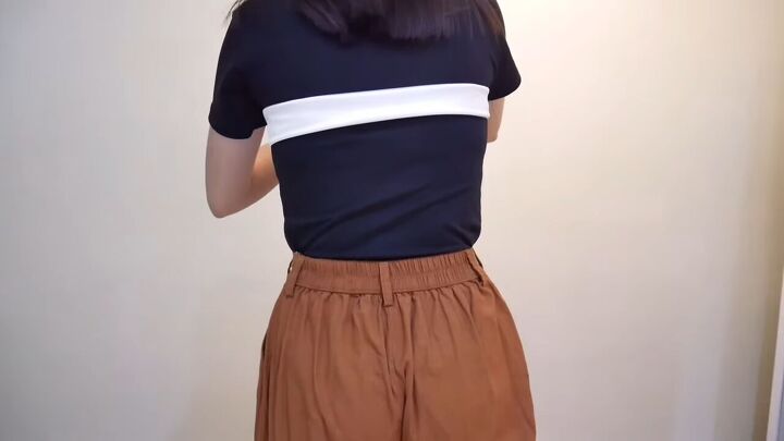how to make an easy diy o ring top you can wear 6 different ways, Folding the fabric into a thin strip