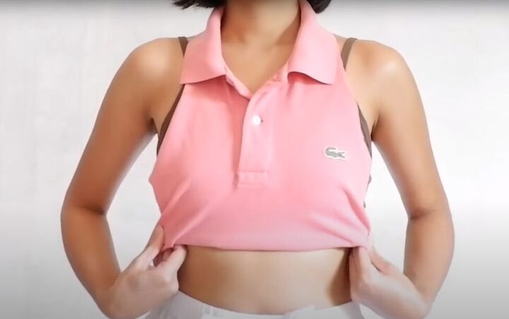 how to make a halter top out of a polo shirt 2 different ways, Trying on the halter top to adjust the hem