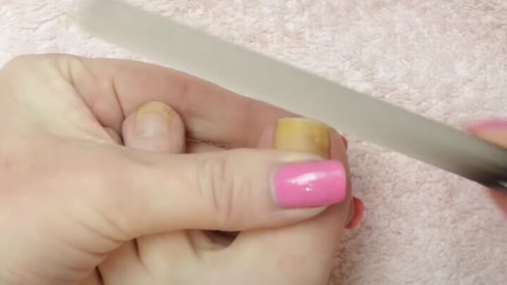 how to give yourself an amazing toenail makeover at home, Filing toenails with a nail file