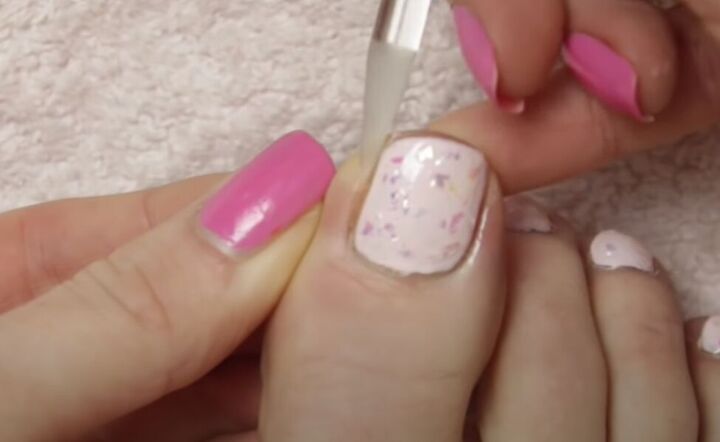 how to give yourself an amazing toenail makeover at home, Cleaning up nail polish around the toenails
