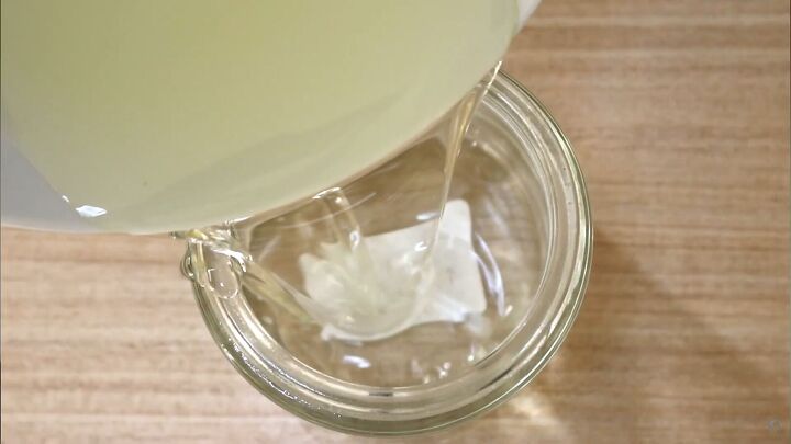 how to make an all natural toxin free plastic free diy moisturizer, Decanting the DIY moisturizer into a glass jar