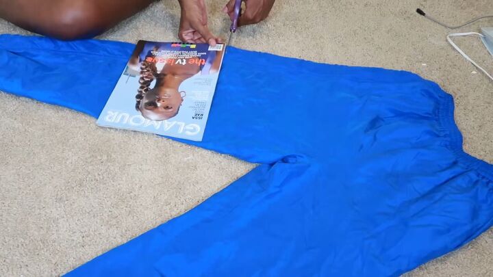how to make an easy diy two piece short set out of old sweatpants, Cutting off the pant legs