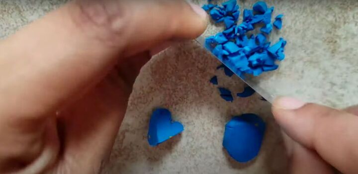 need some faux crystal earrings try this polymer clay geode tutorial, Chopping up blue polymer clay into small pieces