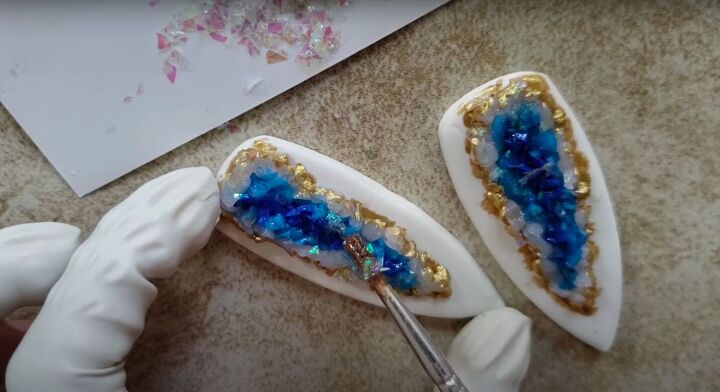 need some faux crystal earrings try this polymer clay geode tutorial, Adding opal glitter flakes