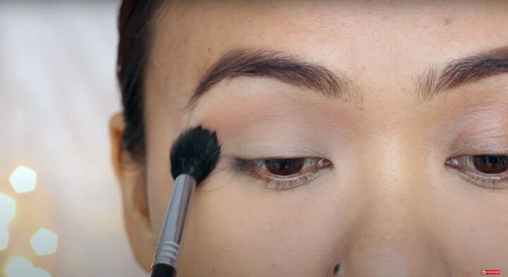 how to do easy beginner eyeshadow step by step 2 simple looks, Applying a light neutral eyeshadow to the crease area