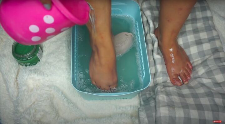 how to do an at home pedicure to get your feet ready for summer, Rinsing the body scrub off