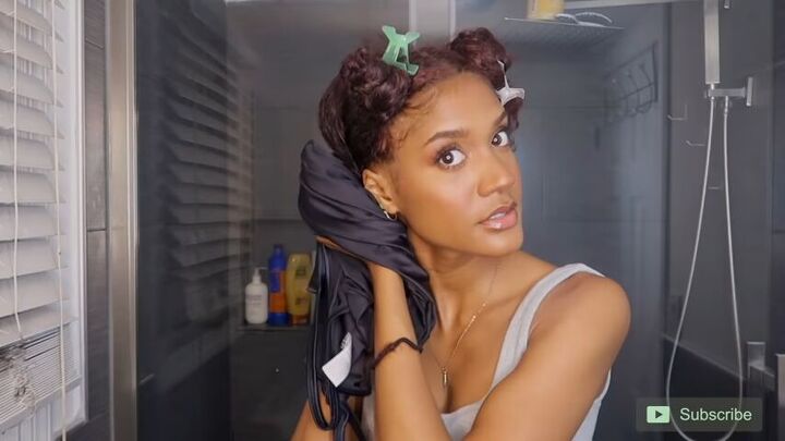 how to get volume in natural hair 12 effective tips tricks, Scrunching out the extra product with a t shirt