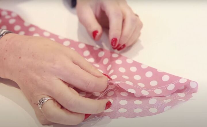 sewing on a sleeve this beginner tutorial shows you how step by step, Pulling on the thread to create gathers