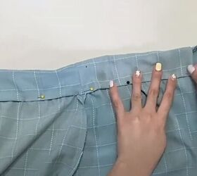 how to make a long diy button down skirt out of an old men s shirt, Folding the waistband over the raw edge