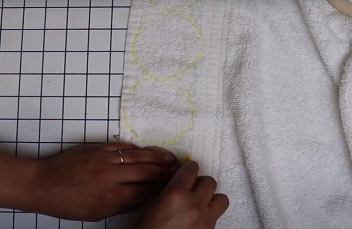 how to make reusable diy facial rounds out of old towels flannels, Cutting the facial rounds out of fabric
