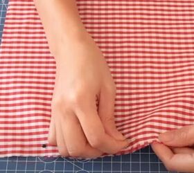 how to turn a skirt into a crop top in 7 simple steps, Pinning the edge of the fabric