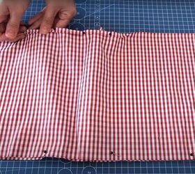 how to turn a skirt into a crop top in 7 simple steps, Folding and pinning the crop top