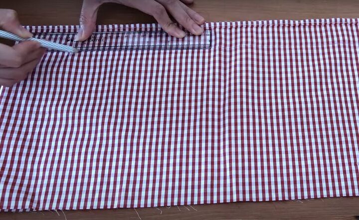 how to turn a skirt into a crop top in 7 simple steps, Marking a line across the fabric