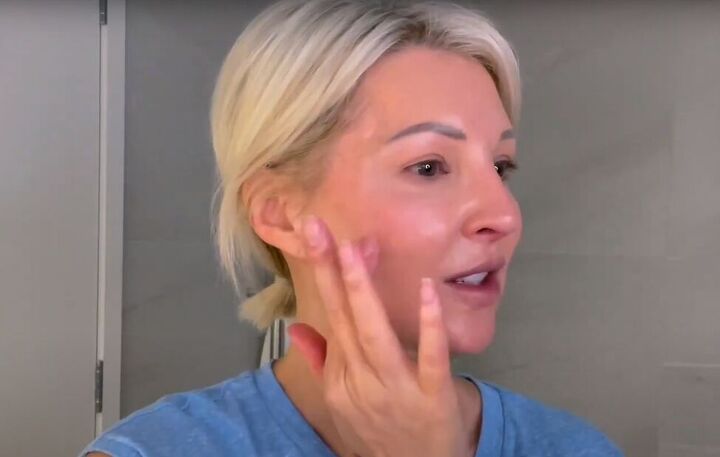 want an everyday glow try this natural makeup tutorial for over 50s, Blending lipstick into the cheeks with fingers