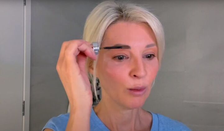 want an everyday glow try this natural makeup tutorial for over 50s, Defining eyebrows with brow mascara