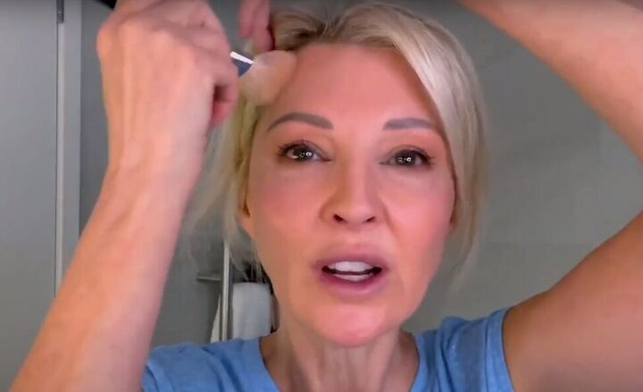want an everyday glow try this natural makeup tutorial for over 50s, Applying bronzer around the hairline