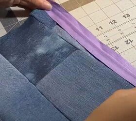 how to sew a makeup bag out of diy patchwork denim fabric, Attaching the zipper to the fabric edge