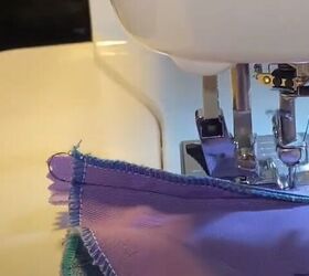 how to sew a makeup bag out of diy patchwork denim fabric, Using a zipper foot to sew the zipper