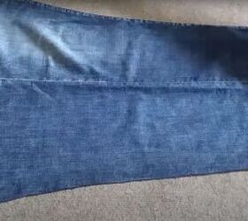 how to make a cute diy denim crop top out of a pair of old jeans, Cutting open the side seam of the jeans