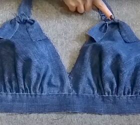 how to make a cute diy denim crop top out of a pair of old jeans, Tying bows around the straps
