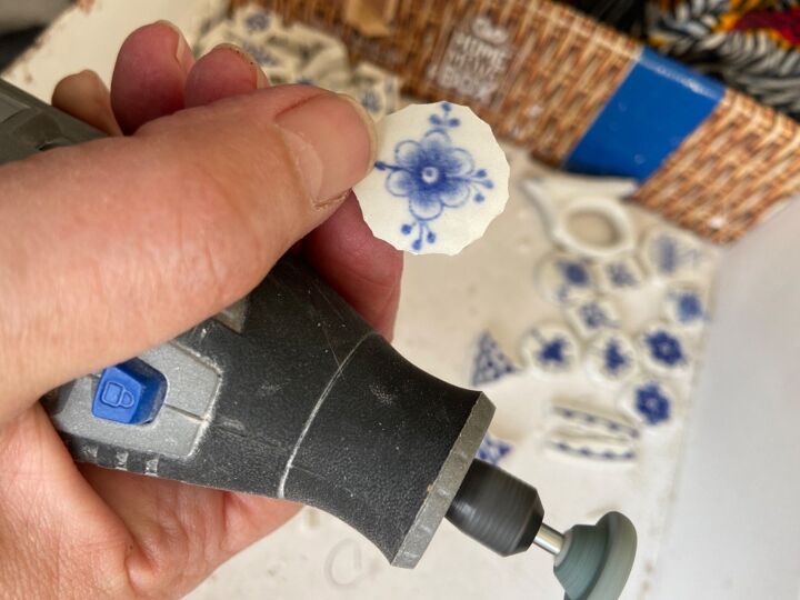 how to create a pair of original ceramic earrings from an old tea cup, Sanding wheel
