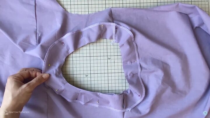 how to sew a skater dress with long sleeves out of an old bedsheet, Pinning the facing to the neckline