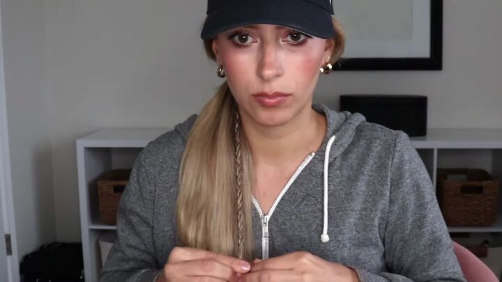 4 easy unique ways to wear a baseball cap with braids, Creating a small three strand braid in the middle of a ponytail