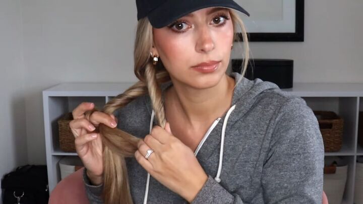 4 easy unique ways to wear a baseball cap with braids, Crossing the two sections over each other