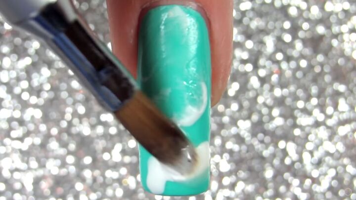 how to do quartz nails easily at home in 5 simple steps, Swirling the nail polish with acetone