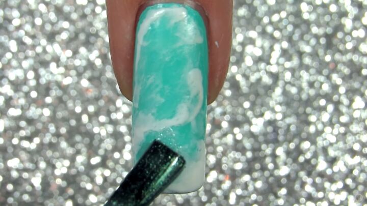 how to do quartz nails easily at home in 5 simple steps, Applying sparkly nail polish to nails