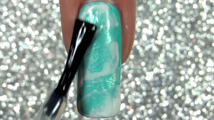 how to do quartz nails easily at home in 5 simple steps, Applying a clear top coat to nails