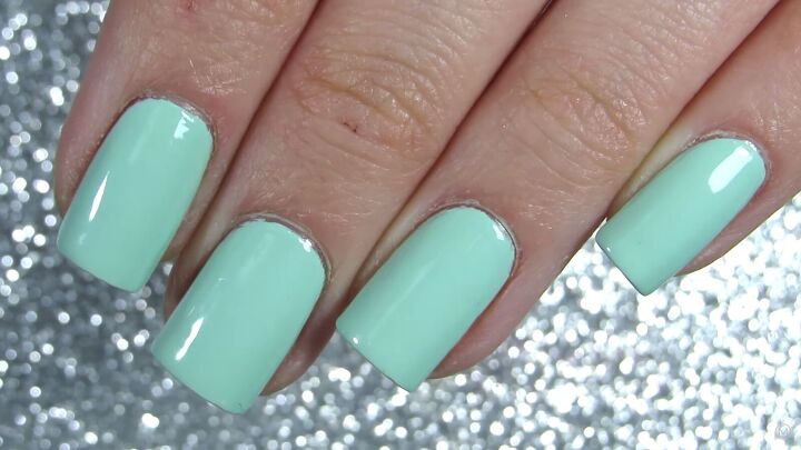 how to do adorable daisy nails for spring in 5 easy steps, Starting with a minty green base color