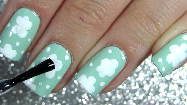 how to do adorable daisy nails for spring in 5 easy steps, Adding a blob of top coat in the center of the daisy