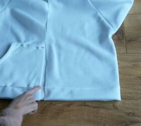 how to make your own zip up hoodie from scratch, Placing the pocket pieces on the hoodie