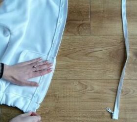 how to make your own zip up hoodie from scratch, Sewing the zipper onto the hoodie