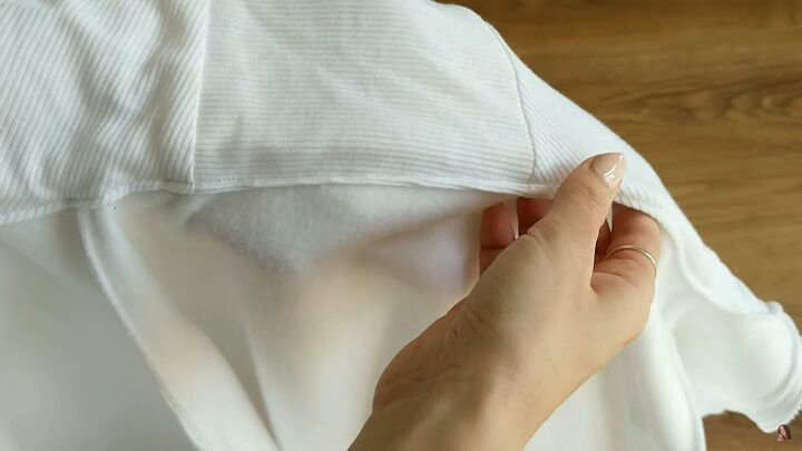 how to make your own zip up hoodie from scratch, Folding the bottom over