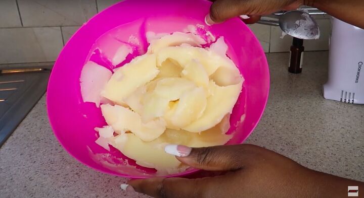 want to get super soft skin try this simple mango body butter recipe, Scraping the butter ready for whipping