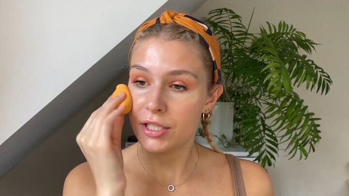 how to cover flaky skin with makeup for a light natural look, Applying foundation to the rest of the face