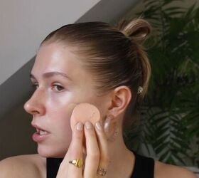 how to create a glowy bronze makeup look for spring summer, Applying foundation with a wet beauty blender
