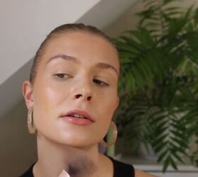 how to create a glowy bronze makeup look for spring summer, Applying bronzer around the face