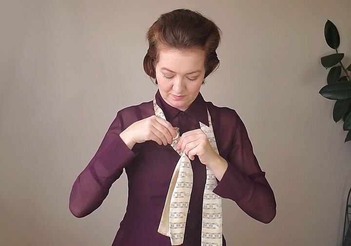 how to wear a silk scarf with a shirt 3 unique looks for the office, Tying a knot in the scarf