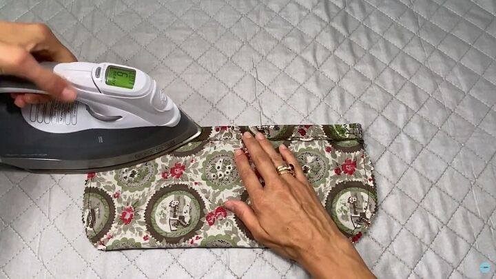 how to make reusable diy shoe covers to keep your house clean, Pressing the casing with an iron
