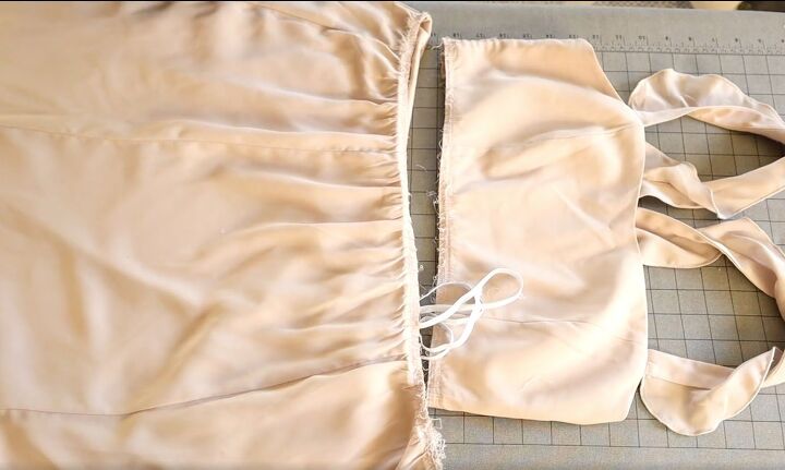 how to easily turn an old bridesmaid dress into a jumpsuit, Seam ripping the bodice from the skirt