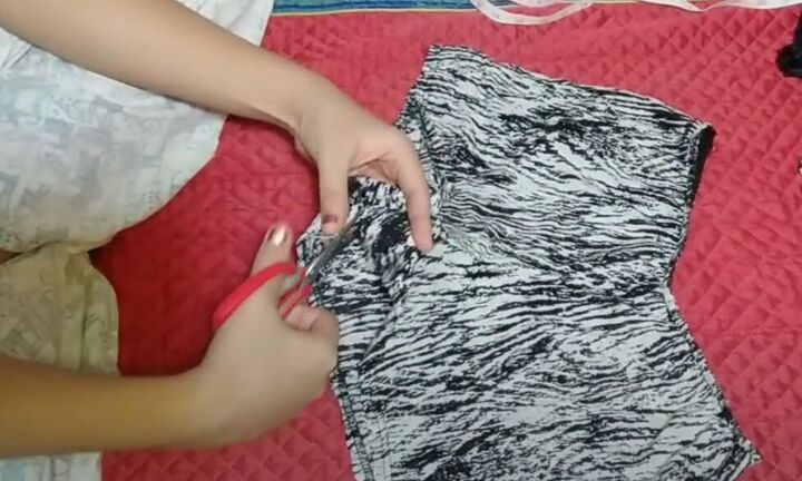 how to make a cute diy scoop back top out of an old romper, Cutting across the center of the crotch
