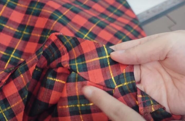 how to sew a puff sleeve top step by step using a free pattern, Folding the seam allowance