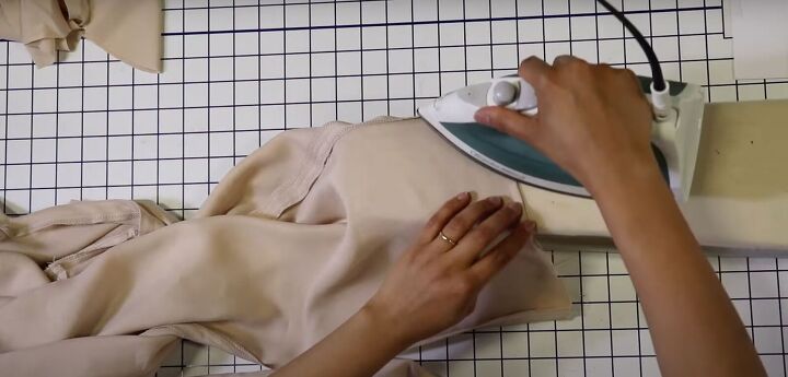 how to make your own jumpsuit from scratch pattern sewing tutorial, Pressing the hem with an iron
