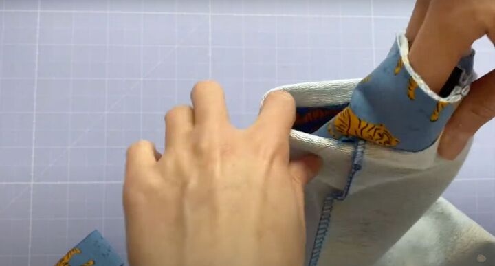 how to make a diy sweatshirt with your own pattern in 6 simple steps, Inserting the sleeve cuff