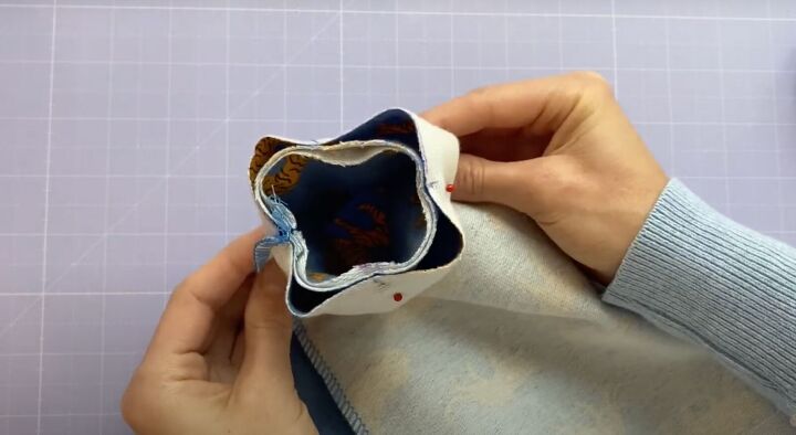 how to make a diy sweatshirt with your own pattern in 6 simple steps, Pinning at the quarter marks