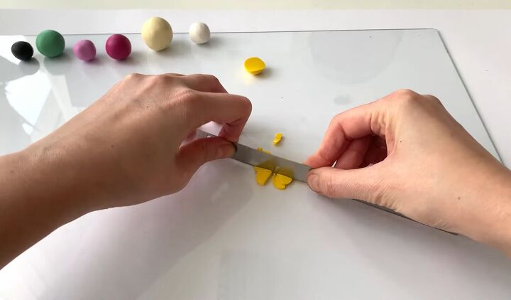 how to make unique polymer clay slab earrings with a paint effect, Cutting the colored polymer clay